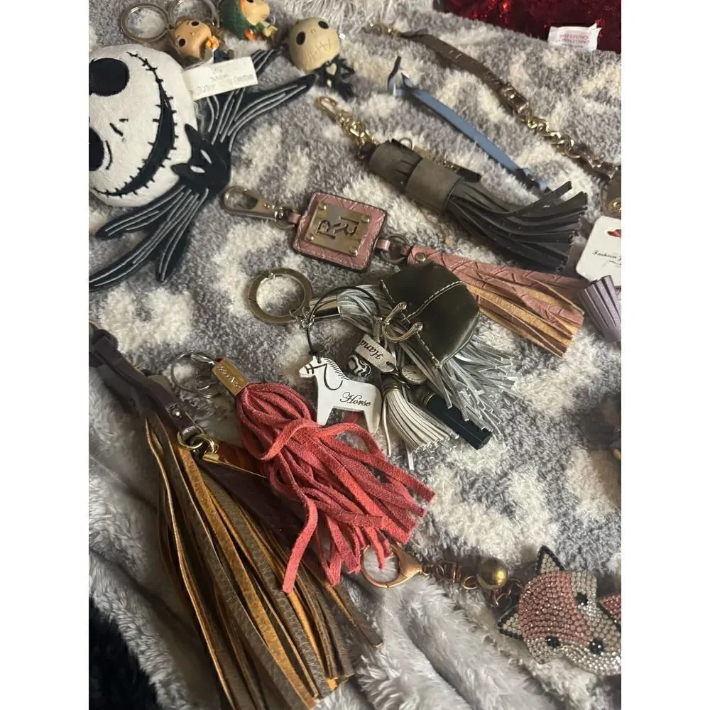 Lot of designer keychains,bag charms bling disney tassell
